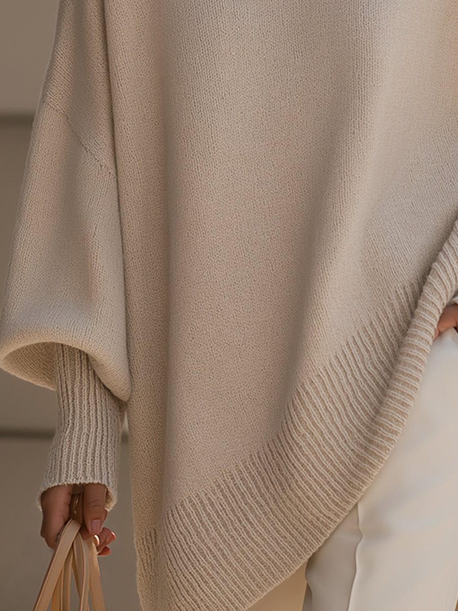 Damski sweter oversized z asymetrycznym dołem