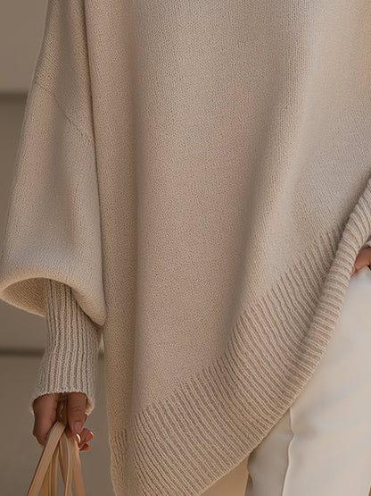 Damski sweter oversized z asymetrycznym dołem