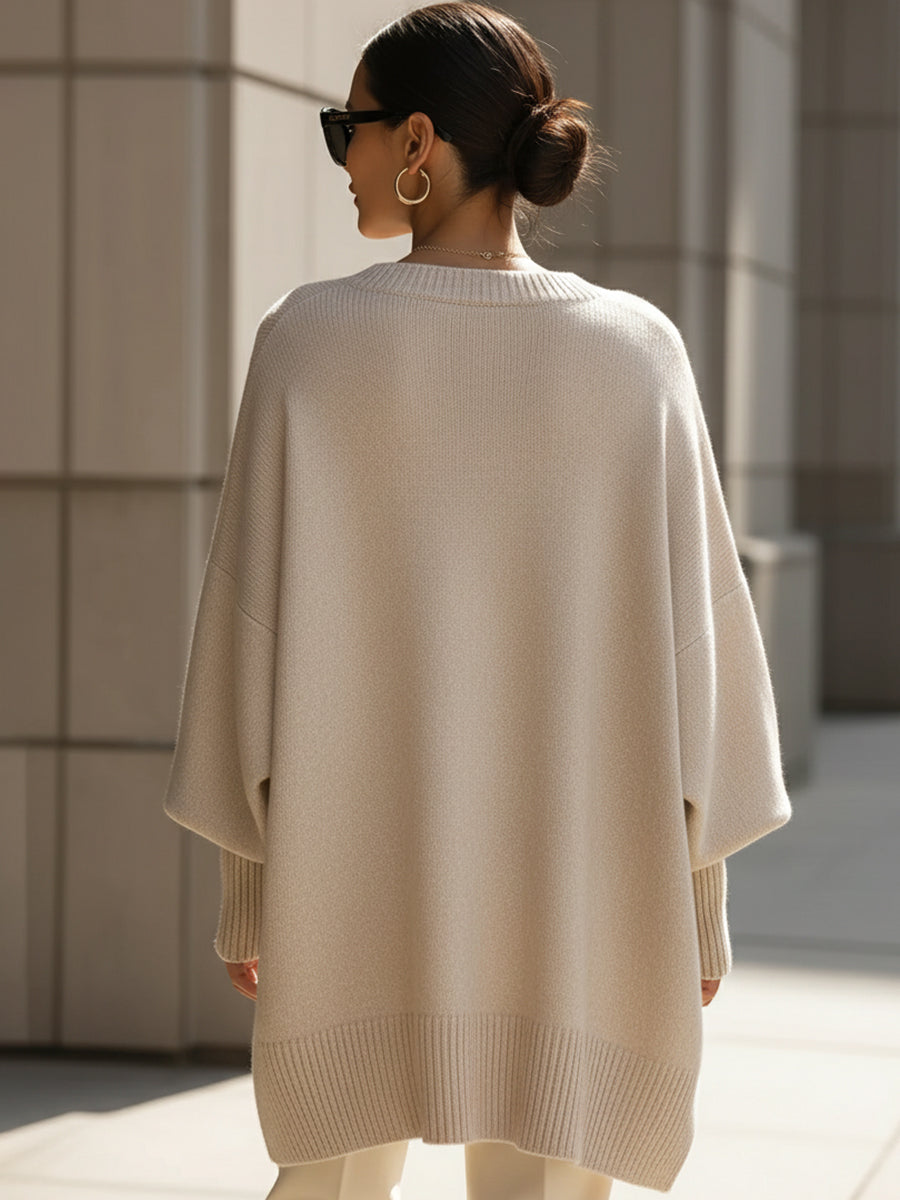 Damski sweter oversized z asymetrycznym dołem