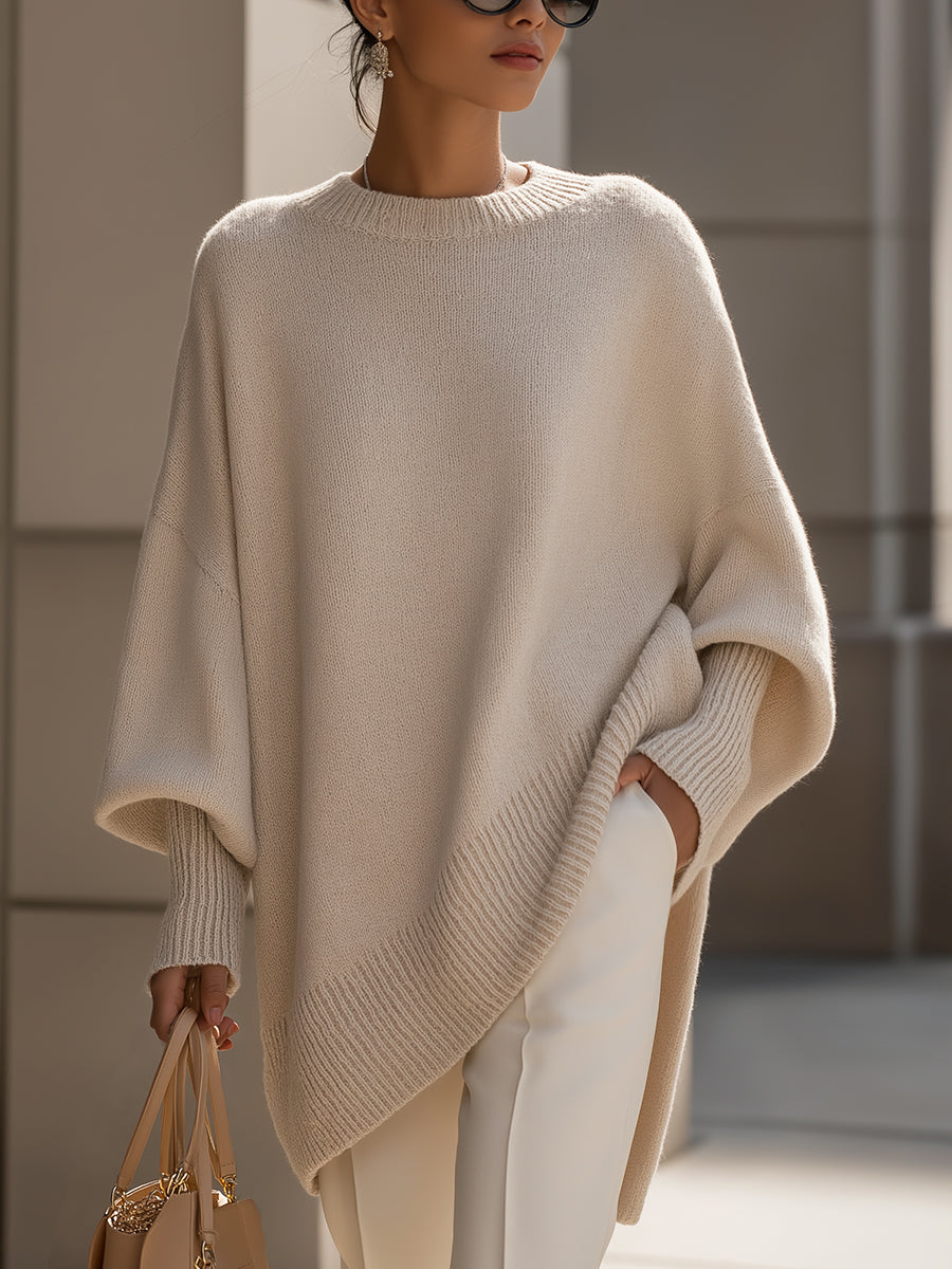 Damski sweter oversized z asymetrycznym dołem