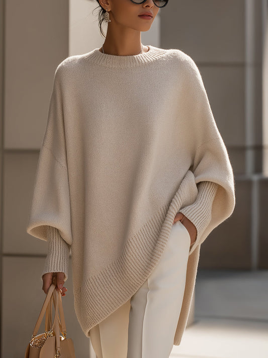 Damski sweter oversized z asymetrycznym dołem
