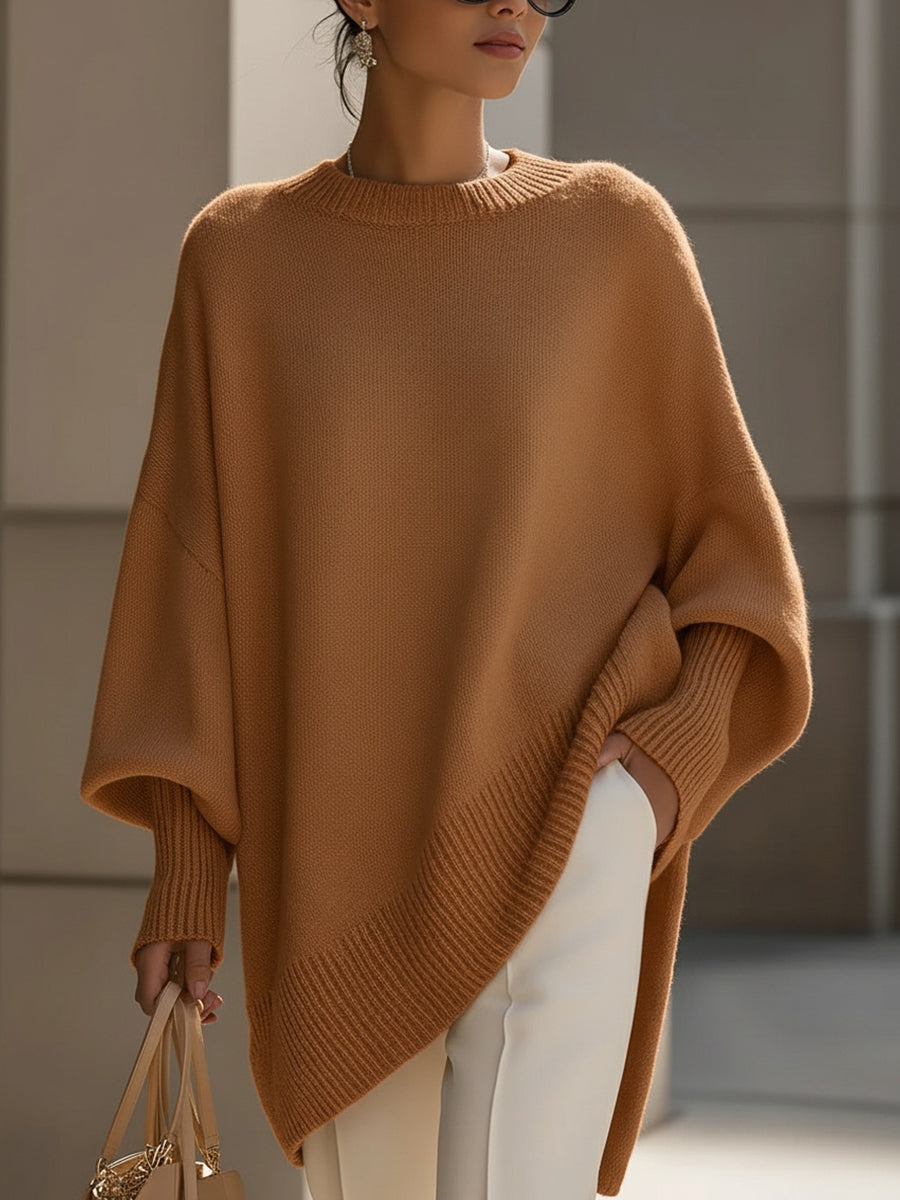 Damski sweter oversized z asymetrycznym dołem