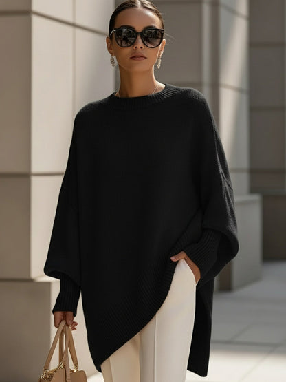 Damski sweter oversized z asymetrycznym dołem