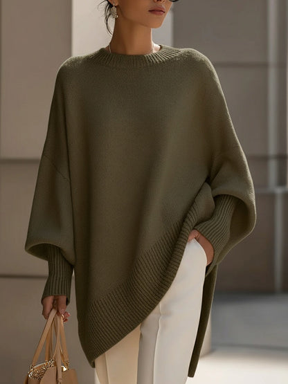 Damski sweter oversized z asymetrycznym dołem