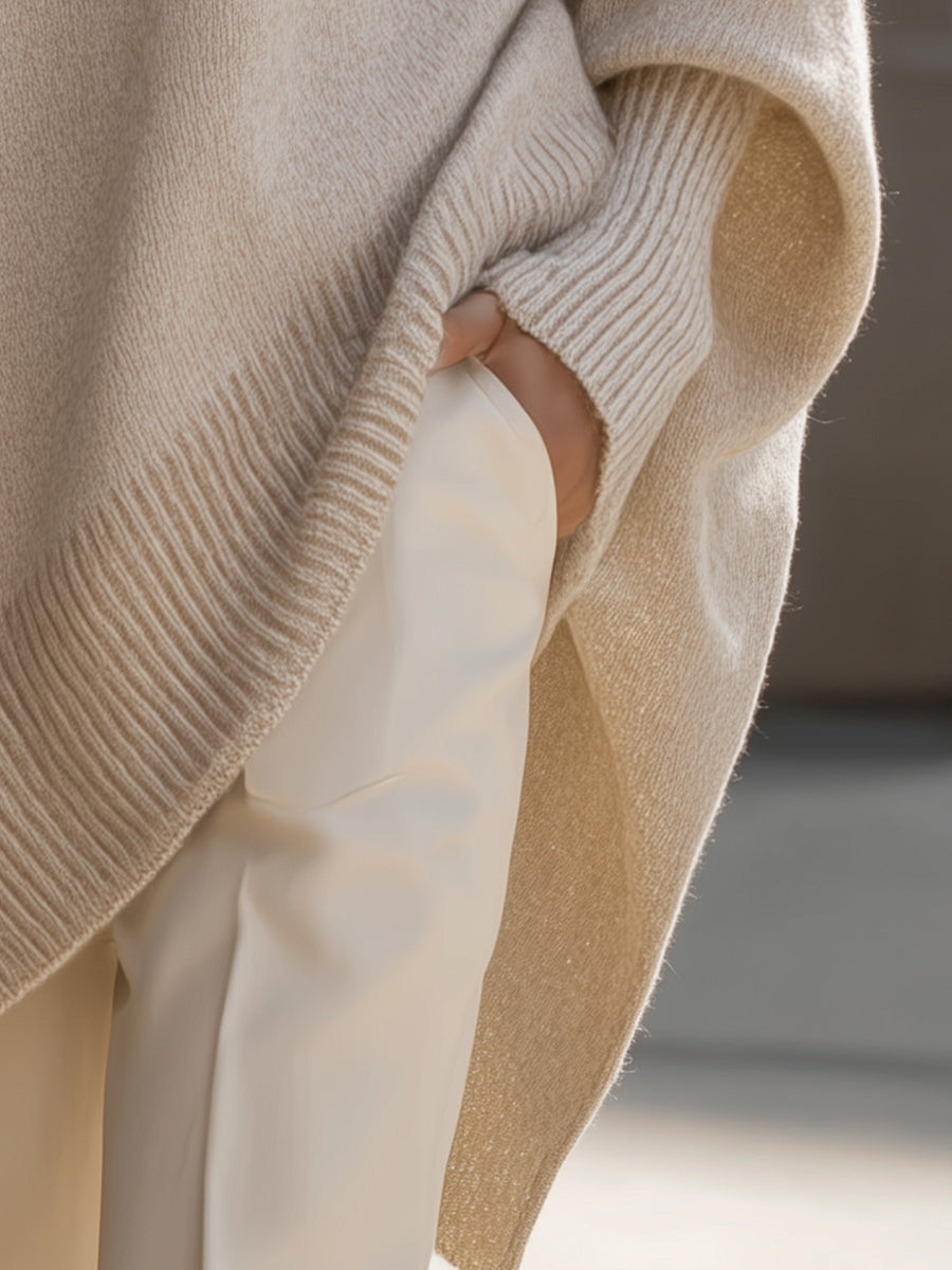 Damski sweter oversized z asymetrycznym dołem